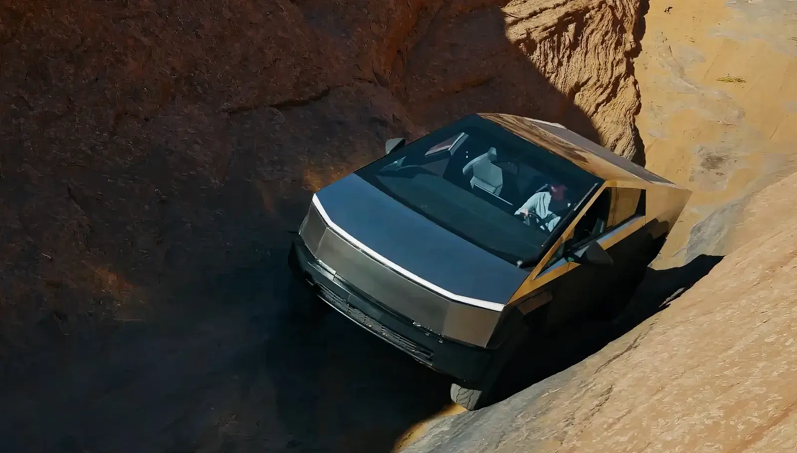 Tesla Cybertruck awkwardly stuck(?) in a canyon off-width